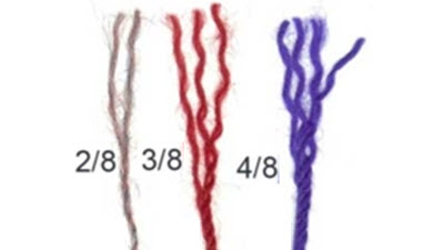 2/8, 3/8, 2/24 | Yarn weights for machine knitting Close-up comparison of three machine knitting yarns showing different ply counts: 2/8, 3/8, and 2/24, demonstrating varying yarn thicknesses