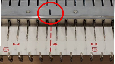 Why does 0 matter? knitting machine needlebed with zero marked