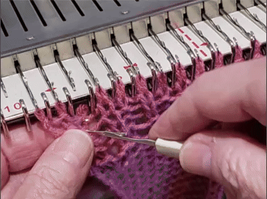 Close-up of a latch tool showing the swinging latch