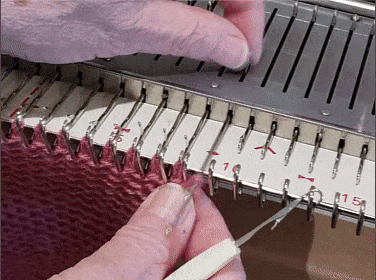 Demonstration of holding the latch tool in hand