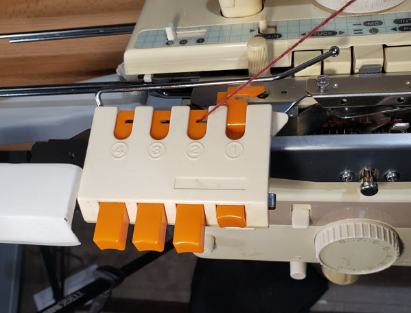 Color Changer attachment for multi-color techniques in machine knitting Color Changer for easy yarn color changes in machine knitting