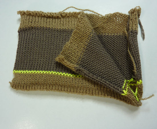 Half-Circular U-Knitting Pattern in Machine Knitting Machine knitted fabric featuring half-circular U-knitting pattern