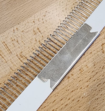 Joiner: Cast On Comb used to join shorter lengths for wider knitting projects in machine knitting Joiner: Cast On Comb for wider knitting in machine knitting
