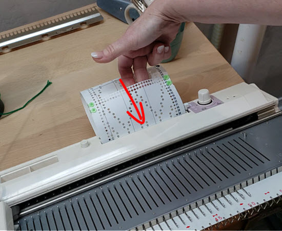 Example of a Punchcard for Pattern Control in Knitting Machines Knitting machine punchcard with pattern holes