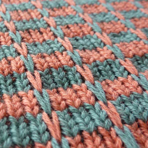 Multi-color Slip technique using alternating yarns to create color patterns with minimal floats in machine knitting Multi-color Slip technique in machine knitting