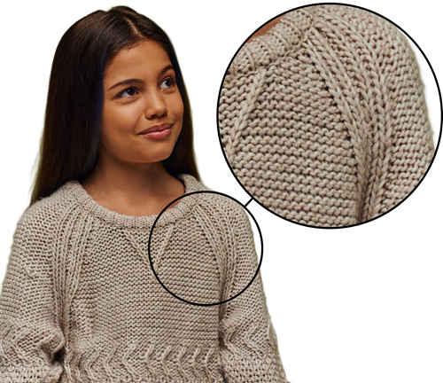 Raglan sleeve design with no shoulder seams, offering versatile fit in machine knitting Raglan sleeve style in machine knitting