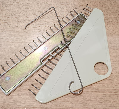 Weight Hangers used to position weights for correct stitch formation in machine knitting Weight Hangers for machine knitting stitch formation