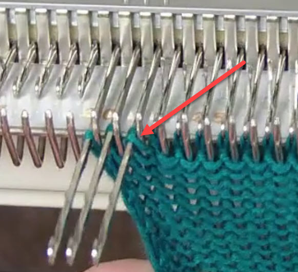 Wrap technique for short rows in machine knitting