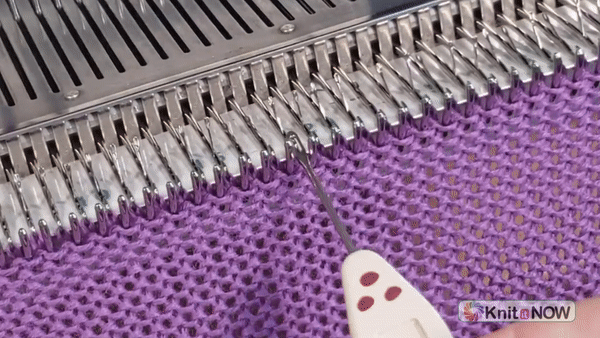 yo (yarn over) technique used in machine knitting to create eyelets for lace and buttonholes yo (yarn over) technique for creating eyelets in machine knitting